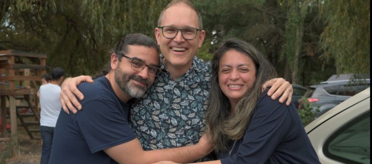 Matt with Jenn Pinares and her husband who have started a new church.