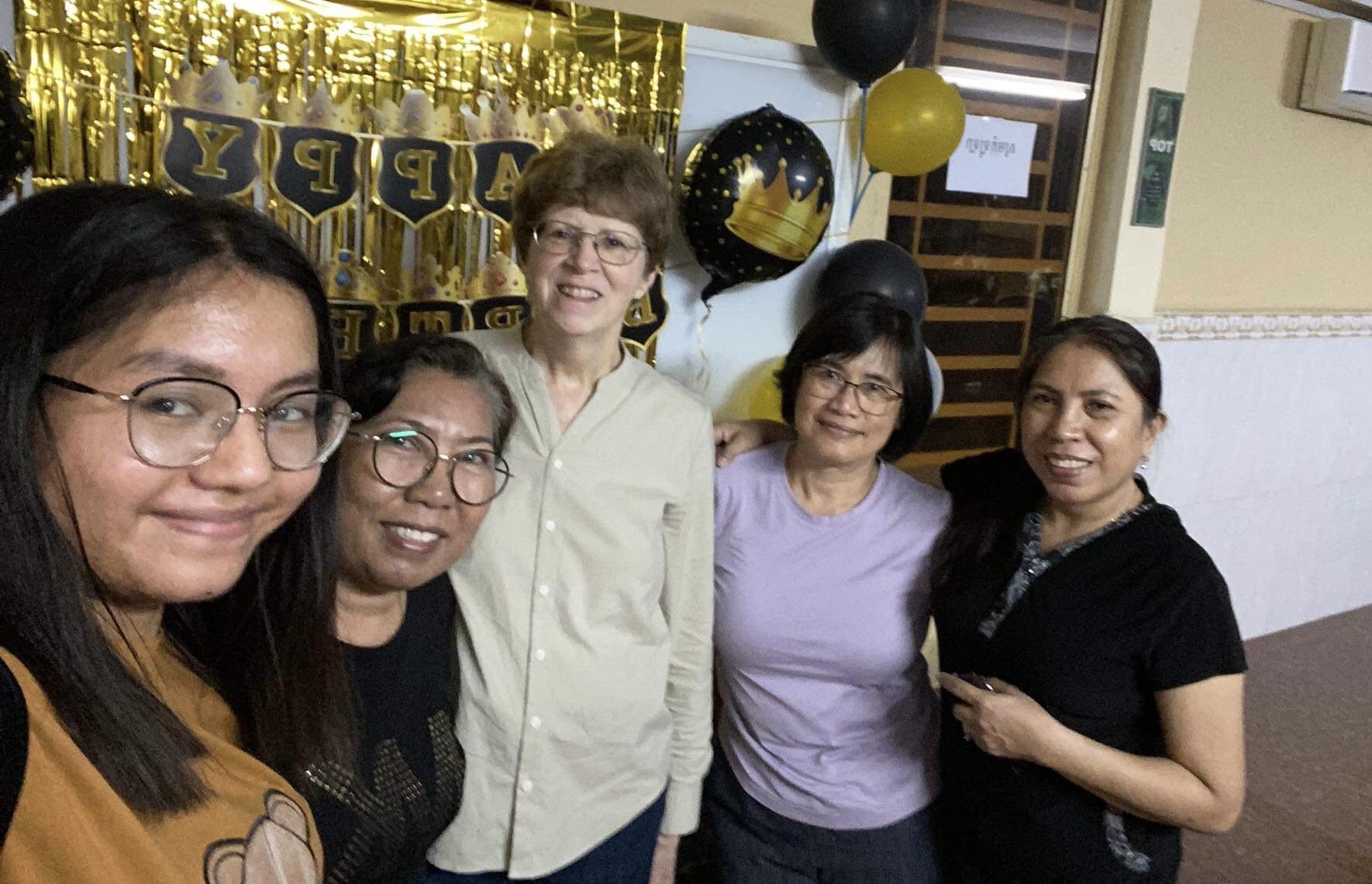Our 2 a.m. birthday celebration; and yes, we have glazed eyes.