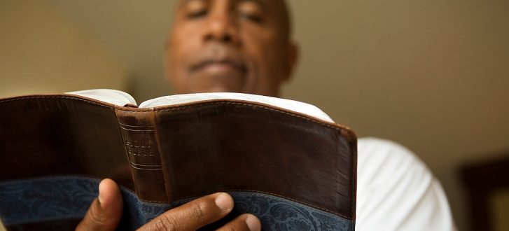 Man reading the Bible