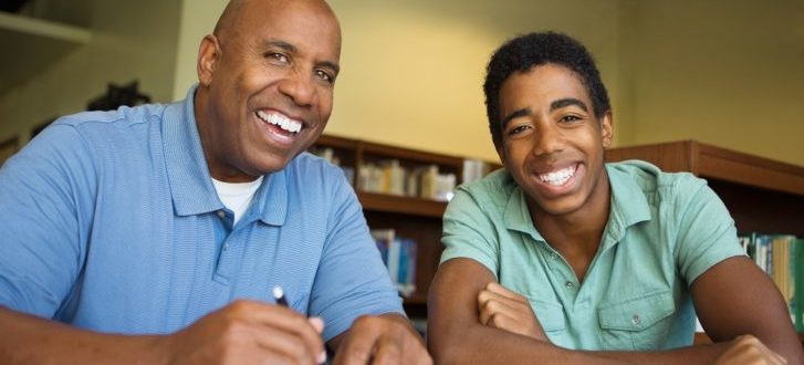 Teacher and student working together